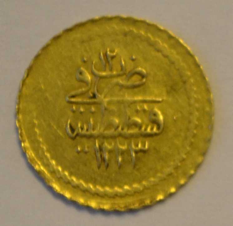 Moneda O01R.jpg
