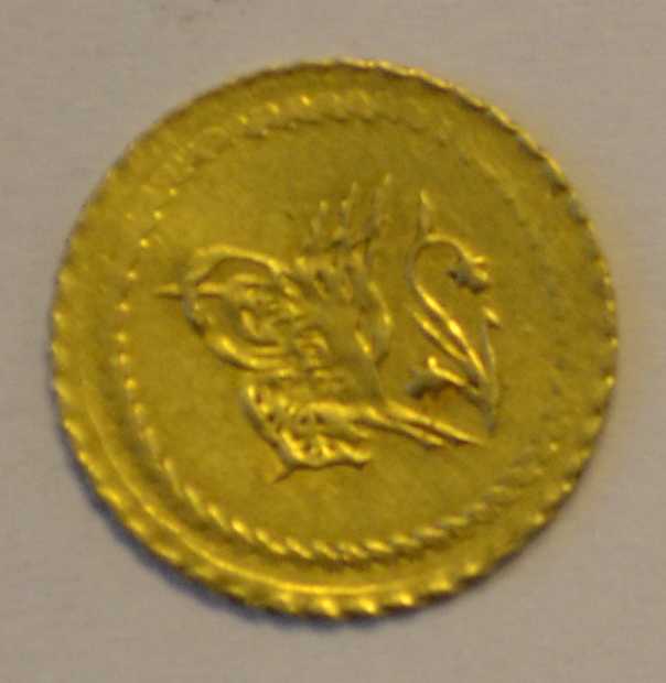 Moneda O01A.jpg